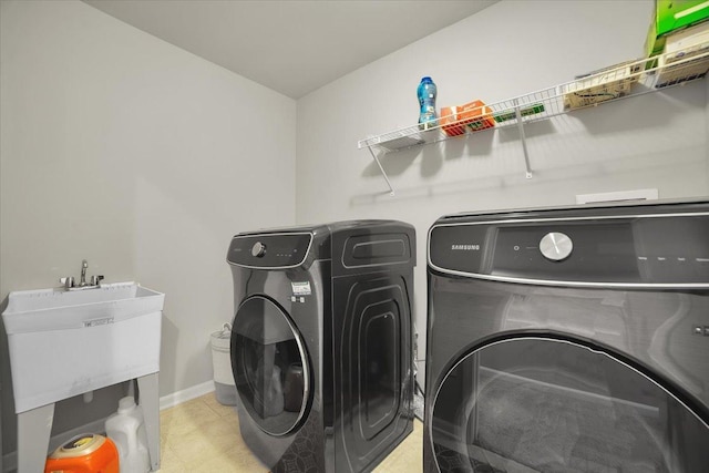 14117 Meadow Ln, Plainfield, IL 60544 - washroom with independent washer and dryer and baseboards