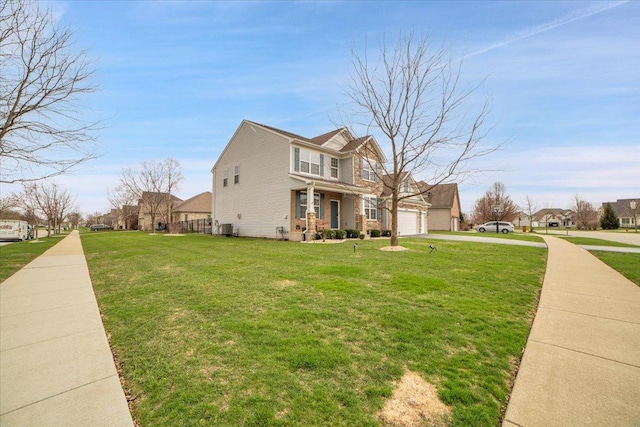 14117 Meadow Ln, Plainfield, IL 60544 - view of property exterior with a garage, a lawn, and driveway