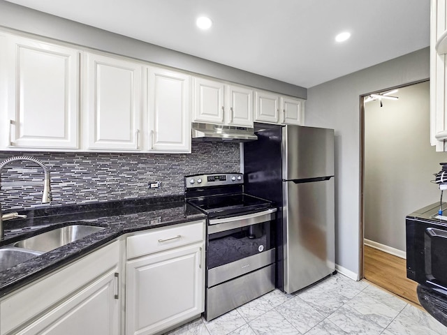 2024 W 111th St Unit 3N, Chicago, IL 60643 - kitchen featuring stainless steel appliances, under cabinet range hood, light marble finish floors, white cabinets, and tasteful backsplash