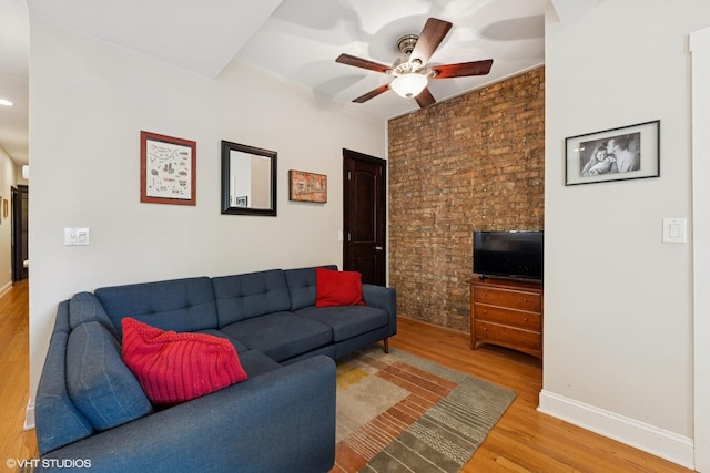 1621 W Rascher Ave Unit 2, Chicago, IL 60640 - living room with wood finished floors, ceiling fan, and baseboards