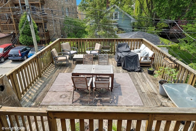 1621 W Rascher Ave Unit 2, Chicago, IL 60640 - wooden deck with an outdoor hangout area and outdoor dining space