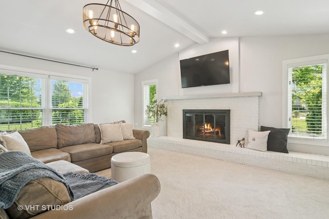 1101 S Nightingale Dr, Palatine, IL 60067 - carpeted living room featuring recessed lighting, healthy amount of natural light, a brick fireplace, and a chandelier