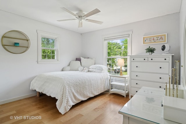 1101 S Nightingale Dr, Palatine, IL 60067 - bedroom with multiple windows, light wood finished floors, and ceiling fan