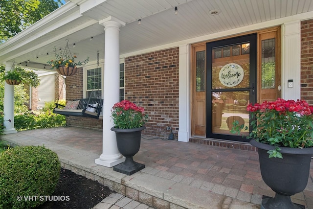 1101 S Nightingale Dr, Palatine, IL 60067 - property entrance with covered porch and brick siding