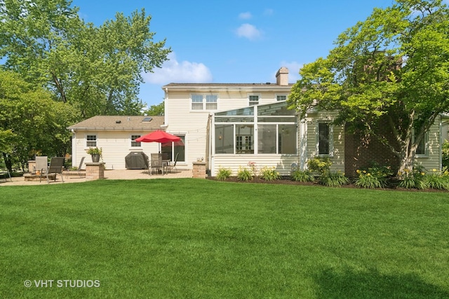 1101 S Nightingale Dr, Palatine, IL 60067 - back of house with a patio area, a yard, and a chimney