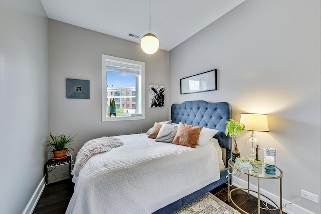 3224 N Elston Ave Unit 2S, Chicago, IL 60618 - bedroom with baseboards and dark wood-type flooring