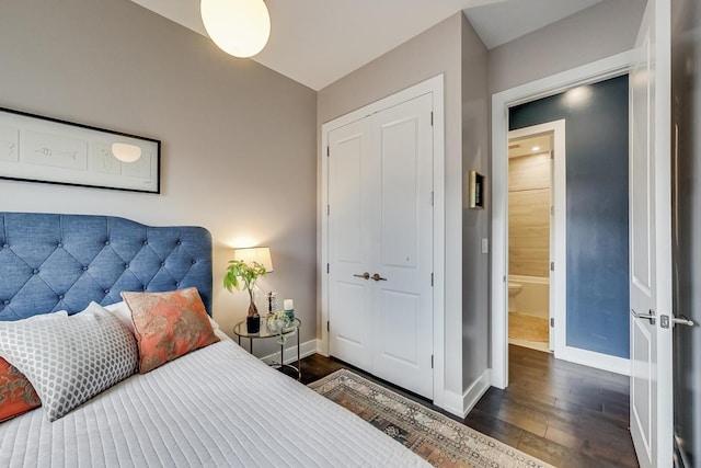 3224 N Elston Ave Unit 2S, Chicago, IL 60618 - bedroom featuring dark wood-type flooring, baseboards, and a closet