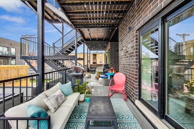 3224 N Elston Ave Unit 2S, Chicago, IL 60618 - wooden deck featuring an outdoor living space