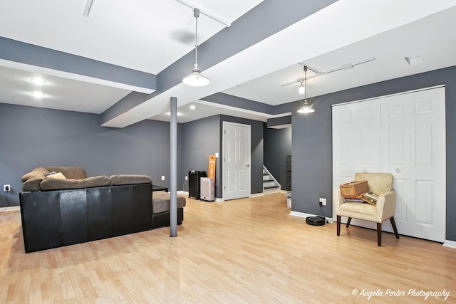 28912 Sawmill Ln, Lakemoor, IL 60051 - living area featuring track lighting, light wood-style floors, and stairs