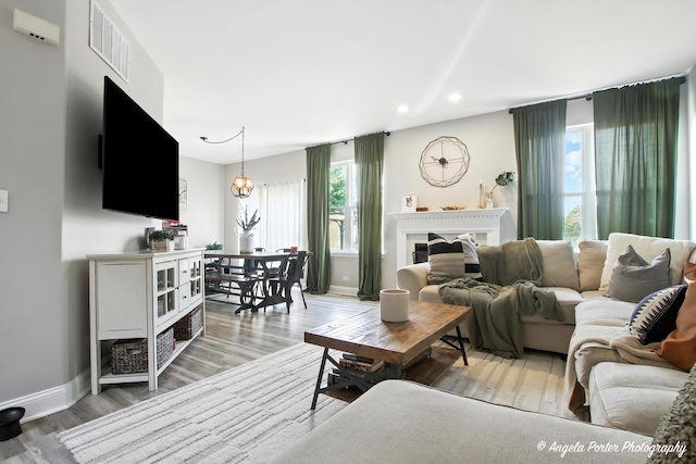 28912 Sawmill Ln, Lakemoor, IL 60051 - living area with light wood finished floors, recessed lighting, and a fireplace
