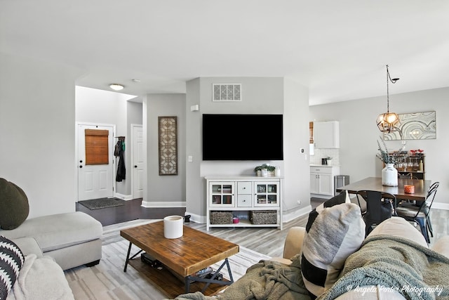 28912 Sawmill Ln, Lakemoor, IL 60051 - living room featuring light wood-style flooring and baseboards