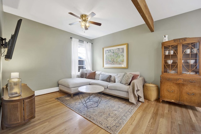 5912 W Grace St, Chicago, IL 60634 - living room with ceiling fan, wood finished floors, baseboards, and beam ceiling