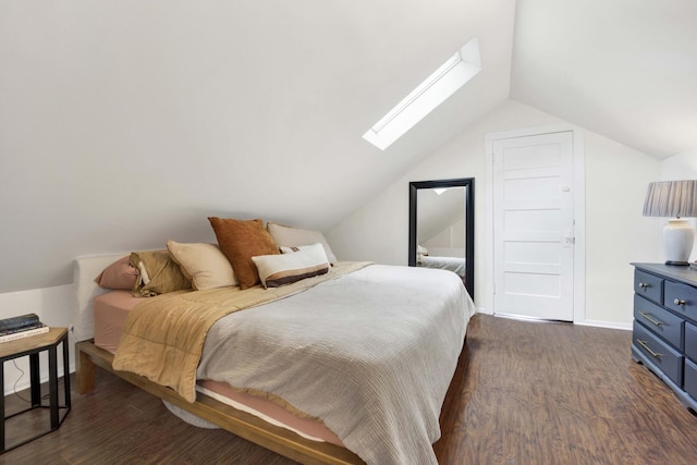 5912 W Grace St, Chicago, IL 60634 - bedroom with a skylight, dark wood-type flooring, vaulted ceiling, and baseboards
