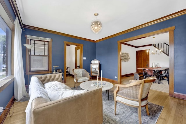 5912 W Grace St, Chicago, IL 60634 - living room featuring a chandelier, baseboards, wood finished floors, and ornamental molding