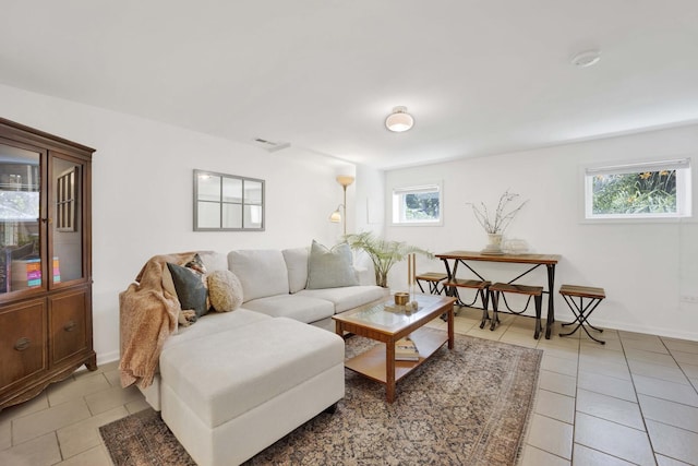 5912 W Grace St, Chicago, IL 60634 - living room with light tile patterned floors and baseboards