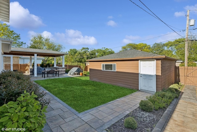 9351 Kostner Ave, Skokie, IL 60076 - view of yard with a patio area and an outbuilding