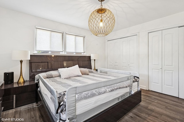 9351 Kostner Ave, Skokie, IL 60076 - bedroom featuring two closets and wood finished floors