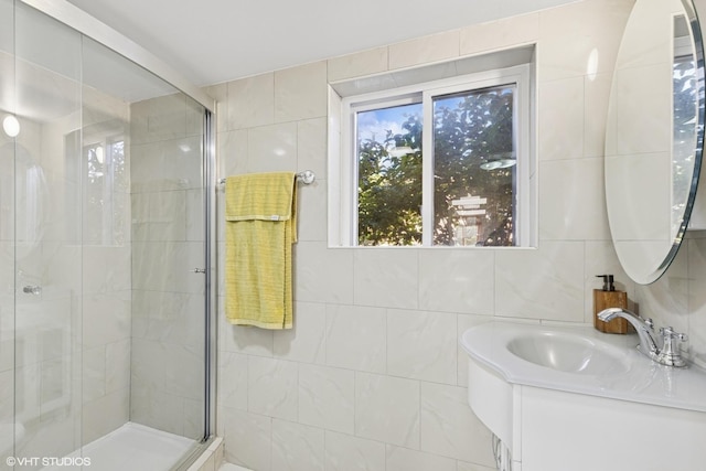 9351 Kostner Ave, Skokie, IL 60076 - full bath with tile walls, vanity, a shower stall, and healthy amount of natural light