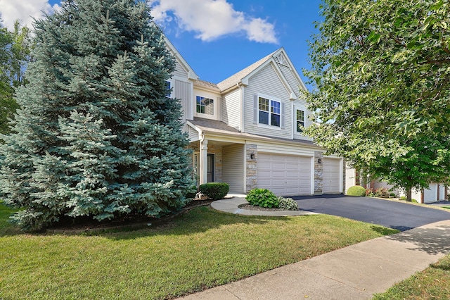 755 Rockhurst Rd, Bolingbrook, IL 60440 - traditional home with an attached garage, driveway, a front yard, and stone siding