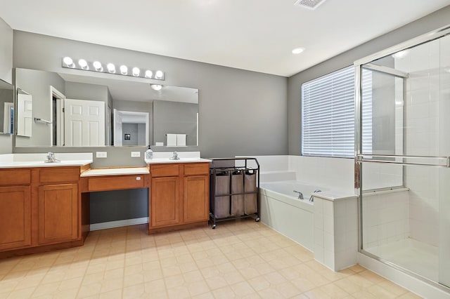 755 Rockhurst Rd, Bolingbrook, IL 60440 - bathroom featuring double vanity, a bath, and a stall shower