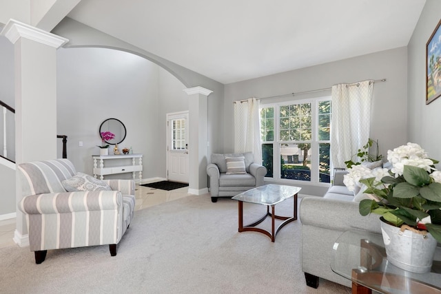 755 Rockhurst Rd, Bolingbrook, IL 60440 - carpeted living room with arched walkways, decorative columns, and vaulted ceiling