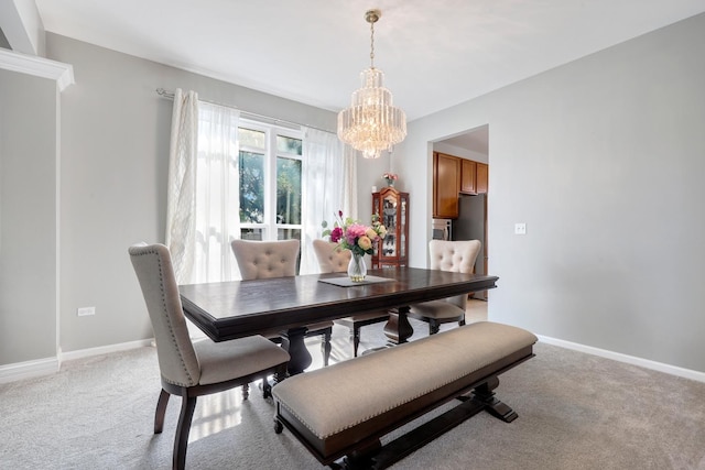 755 Rockhurst Rd, Bolingbrook, IL 60440 - dining area featuring a chandelier and light colored carpet