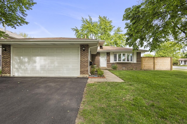3907 New Haven Ave, Arlington Heights, IL 60004 - view of front facade with brick siding, a front lawn, driveway, and a garage