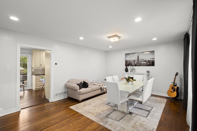 3907 New Haven Ave, Arlington Heights, IL 60004 - dining area featuring dark wood-style flooring, recessed lighting, and baseboards