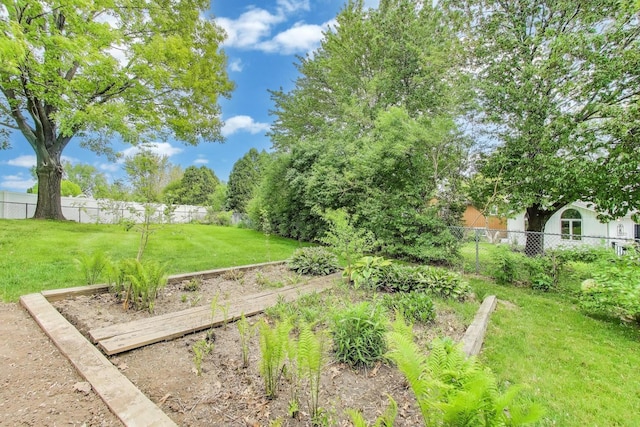 1976 Monday Dr, Elgin, IL 60123 - view of yard with a vegetable garden