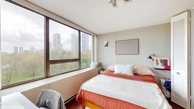 bedroom featuring a view of city