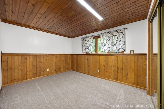 6N510 Sycamore Ave, Saint Charles, IL 60174 - unfurnished room featuring wainscoting, crown molding, wooden ceiling, carpet floors, and baseboards