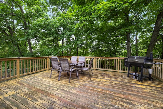 6N510 Sycamore Ave, Saint Charles, IL 60174 - wooden deck featuring outdoor dining space, view of scattered trees, and a grill