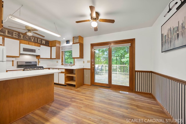 6N510 Sycamore Ave, Saint Charles, IL 60174 - kitchen featuring white appliances, a ceiling fan, light countertops, and white cabinetry