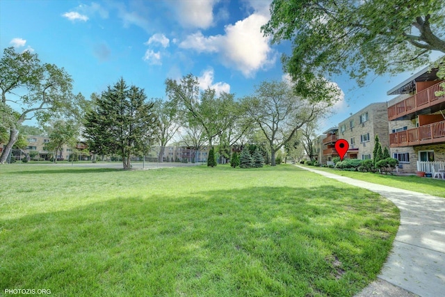 view of community with a lawn