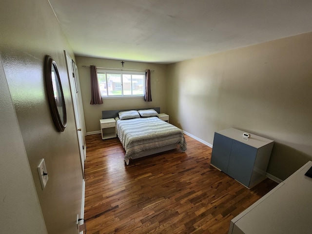 237 Sumac Ln, Schaumburg, IL 60193 - bedroom with dark wood-style floors and baseboards