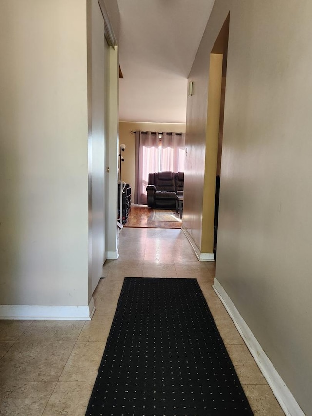 237 Sumac Ln, Schaumburg, IL 60193 - corridor featuring baseboards and tile patterned floors