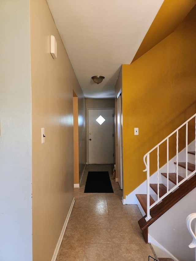 237 Sumac Ln, Schaumburg, IL 60193 - doorway with baseboards and stairway