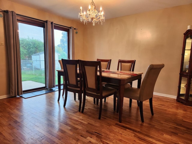 237 Sumac Ln, Schaumburg, IL 60193 - dining room with hardwood / wood-style floors, a chandelier, and baseboards
