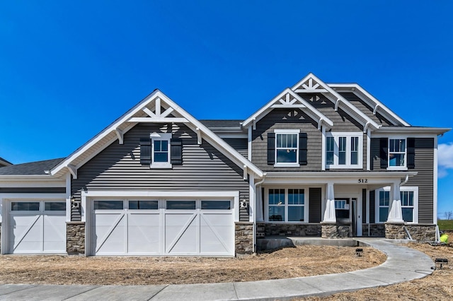 1995 Norwich Ln, Bolingbrook, IL 60490 - craftsman house with stone siding and a porch