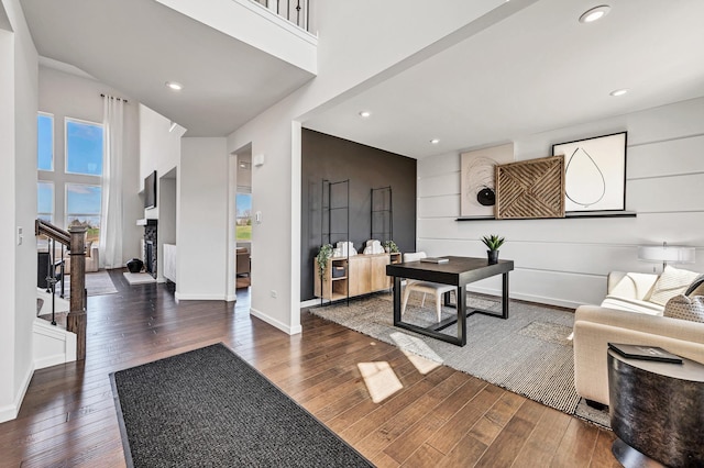1995 Norwich Ln, Bolingbrook, IL 60490 - living area featuring wood-type flooring, a high ceiling, baseboards, recessed lighting, and a fireplace