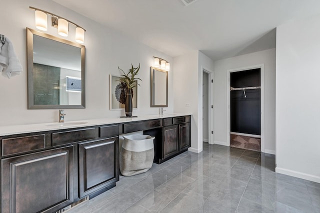 1995 Norwich Ln, Bolingbrook, IL 60490 - full bathroom featuring baseboards, double vanity, a spacious closet, and marble finish floors