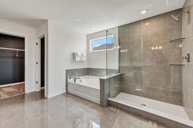 1995 Norwich Ln, Bolingbrook, IL 60490 - bathroom with a stall shower, a garden tub, baseboards, marble finish floors, and recessed lighting