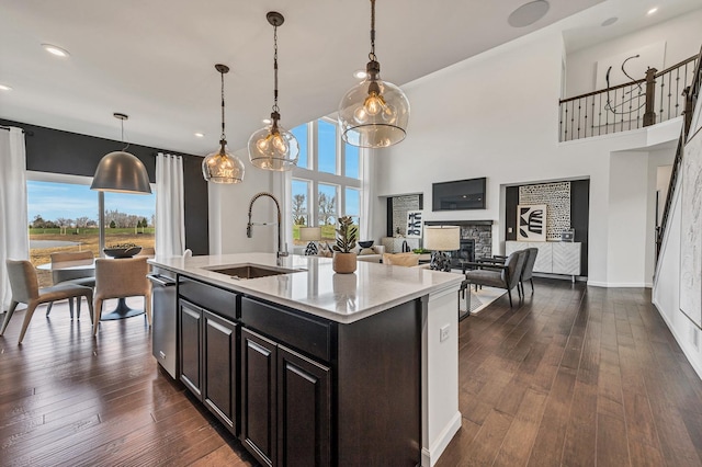 1995 Norwich Ln, Bolingbrook, IL 60490 - kitchen featuring a sink, plenty of natural light, open floor plan, a fireplace, and recessed lighting
