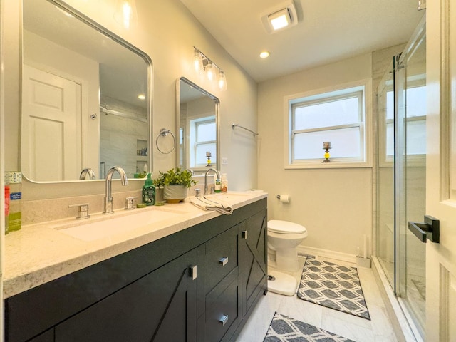 8024 N Odell Ave, Niles, IL 60714 - full bath featuring a shower stall, toilet, double vanity, recessed lighting, and baseboards