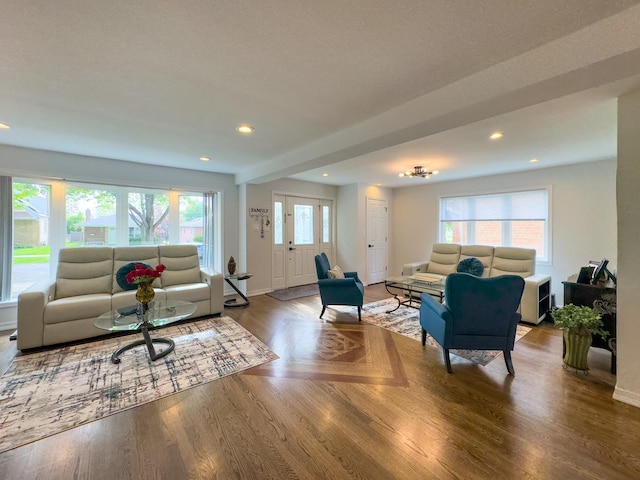 8024 N Odell Ave, Niles, IL 60714 - living area featuring recessed lighting, wood finished floors, and baseboards