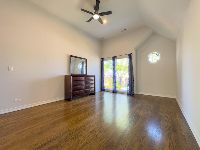 8024 N Odell Ave, Niles, IL 60714 - unfurnished bedroom with dark wood-type flooring, baseboards, vaulted ceiling, and a ceiling fan