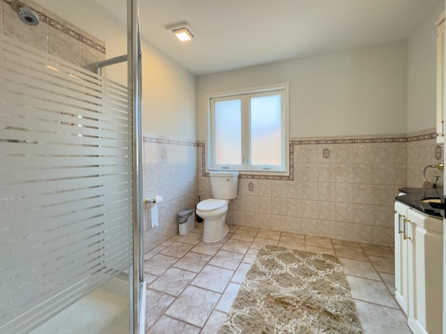 8024 N Odell Ave, Niles, IL 60714 - full bathroom featuring tile walls, a stall shower, wainscoting, toilet, and vanity