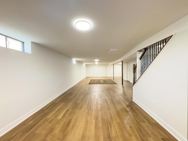 8024 N Odell Ave, Niles, IL 60714 - basement featuring wood finished floors, baseboards, and stairs