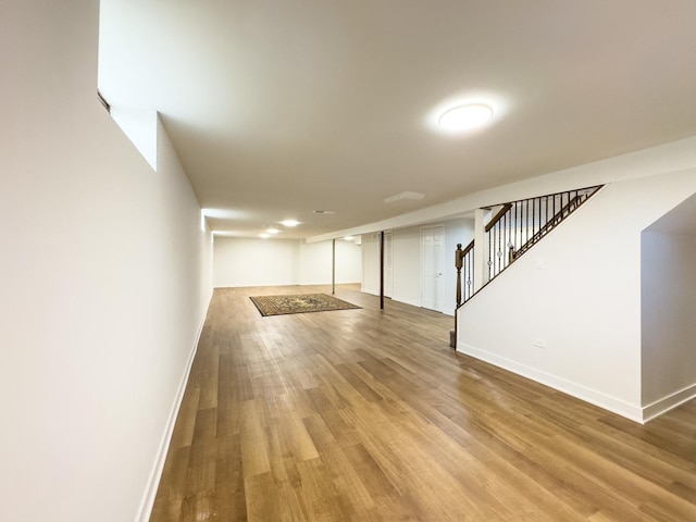 8024 N Odell Ave, Niles, IL 60714 - finished basement featuring baseboards, wood finished floors, and stairs