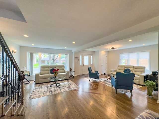 8024 N Odell Ave, Niles, IL 60714 - living area featuring stairway, wood finished floors, and recessed lighting